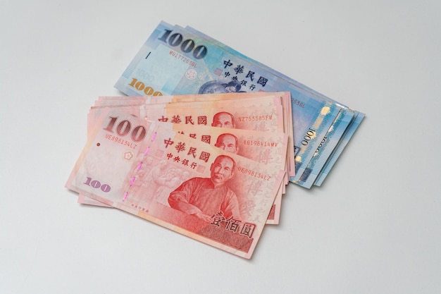 taiwanese dollar banknote on white background