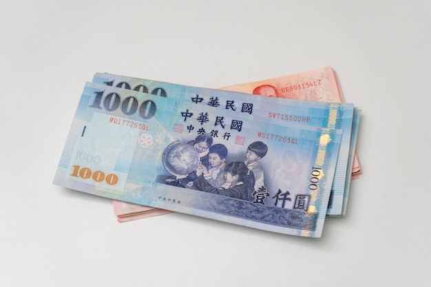Taiwanese dollar banknote on white background