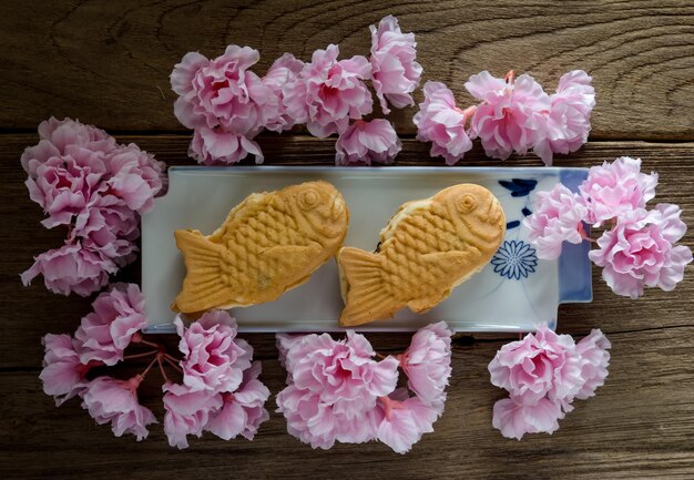 Taiyaki cakes on wood backgroundJapanese confectionery