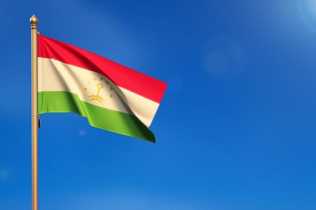 Tajikistan Flag blown by the wind with blue sky in the background