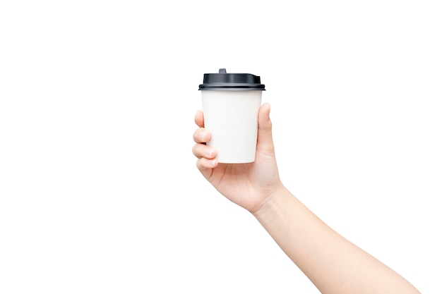 Take away coffee cup. Female hand holding a coffee paper cup isolated