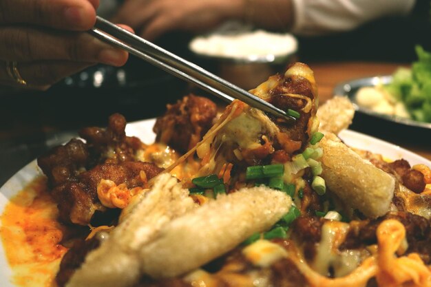 Photo take food using chopsticks