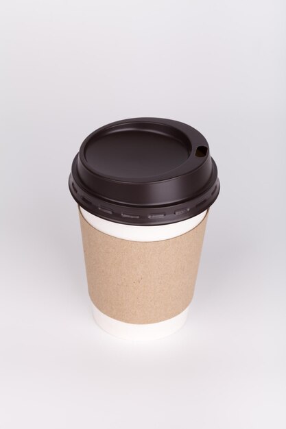 Takeout coffee with cup holder on white background