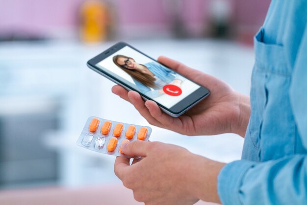 taking medication and pills for the treatment of diseases and well-being. consultation with a doctor online.