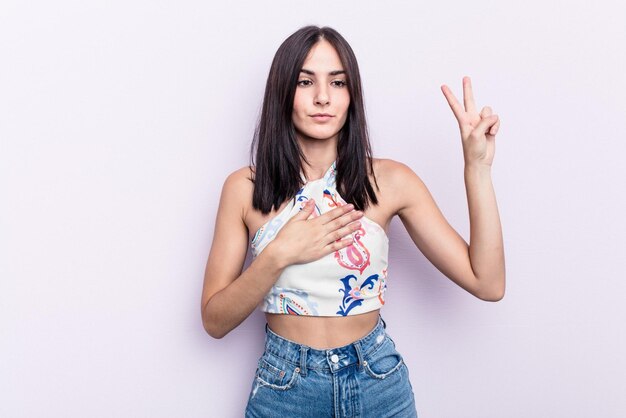 Photo taking an oath putting hand on chest