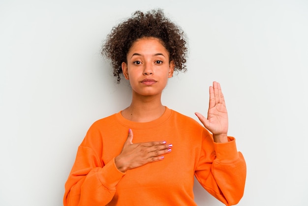 Photo taking an oath putting hand on chest