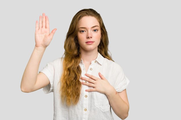 Taking an oath putting hand on chest