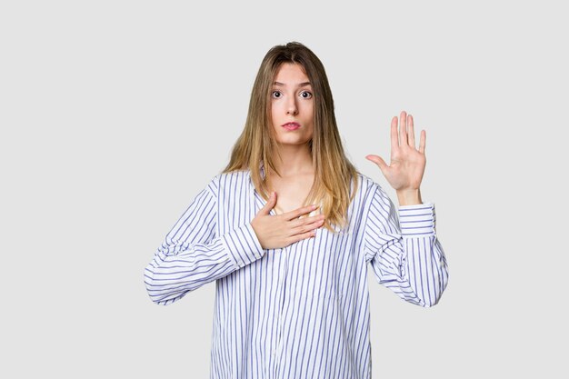 Taking an oath putting hand on chest