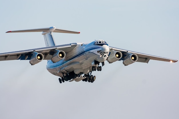 Taking off of the wide body cargo plane and retracting the landing gear