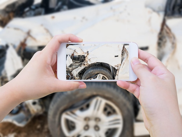 Taking photo of the car crash accident damage