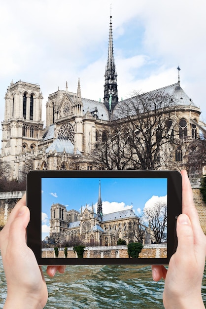 Taking photo of cathedral NotreDame de Paris