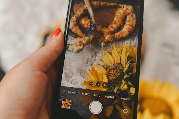 TAKING A PICTURE OF FRESH BREAD