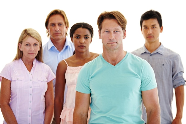 Taking a stand for unity Five adults of varying ages and ethnicities standing in a group with serious expressions