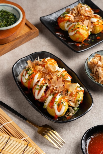 Takoyaki is a ballshaped Japanese snack made of a wheat flourbased batter and cooked in a special molded pan