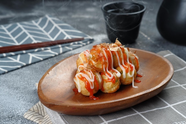 takoyaki  is one of the popular Japanese snacks