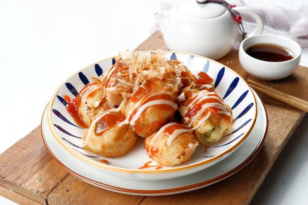 takoyaki or octupus ball is one of the popular Japanese snacks