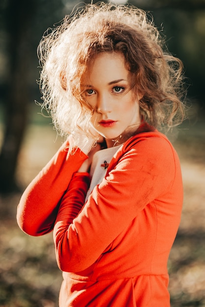 tale. fantastic redhead girl in a mysterious forest