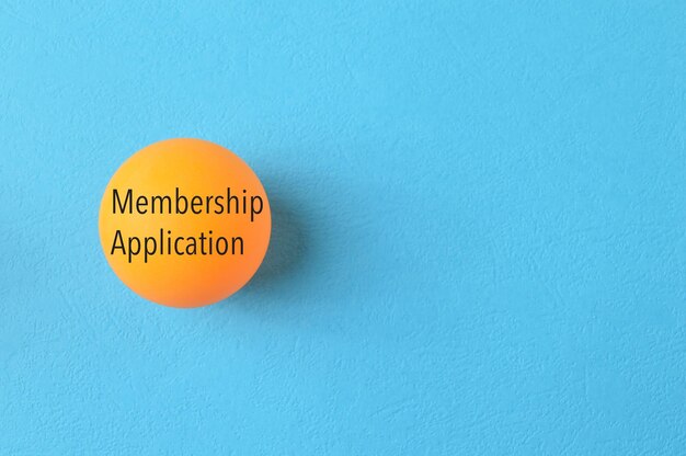 Tale tennis ball with phrase MEMBERSHIP APPLICATION