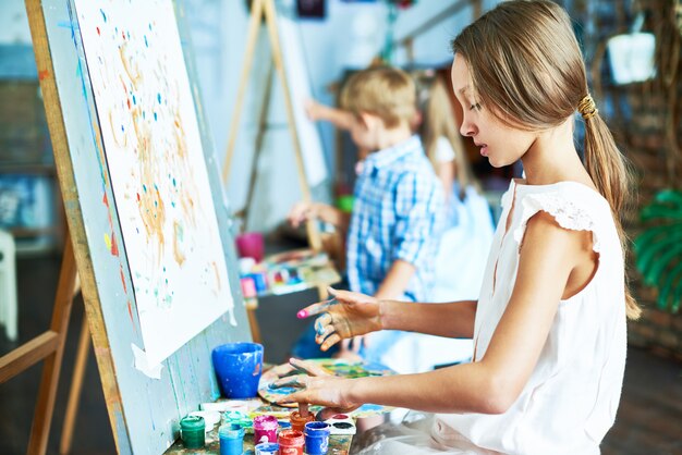 Talented Little Girl in Art Studio