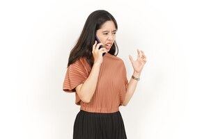 Talking on the phone and angry of beautiful asian woman isolated on white background