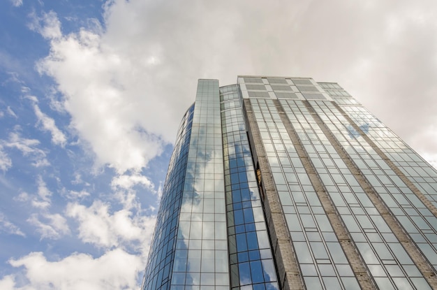 A tall building with a blue sky behind it