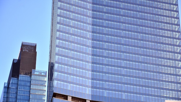 a tall building with a blue sky behind it