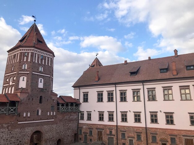 Tall steeples and towers the roof of an old ancient medieval baroque castle a renaissance Gothi