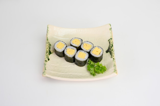 Tamago maki sushi roll seaweed with japanese rice