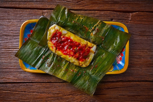 Foto tamale mexicaans recept met banaanbladeren