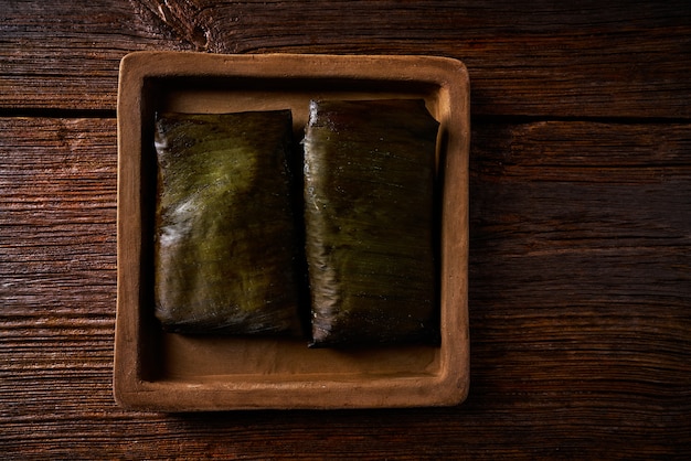 Tamale Mexican recipe with banana leaves