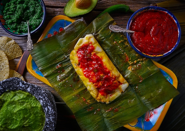 Photo tamale mexican recipe with banana leaves