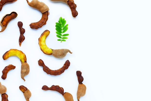 Tamarind tropical fruit on white background. Top view