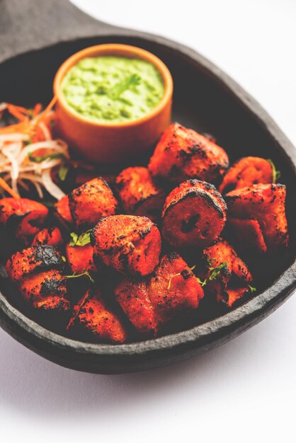 tandoori soya chaap or soy chap dish prepared by marinating in tandoori spices closeup view