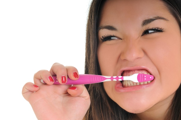 tandzorgconcept met mooie lachende jonge vrouw en tandenborstel