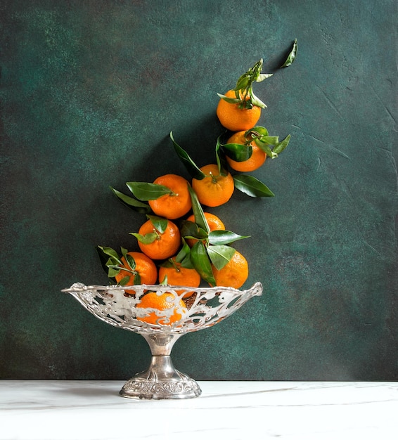 Tangerine fruits Orange mandarine green leaves