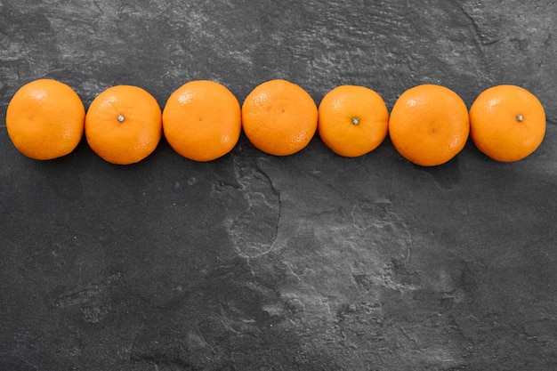 Tangerine isolated on dark background