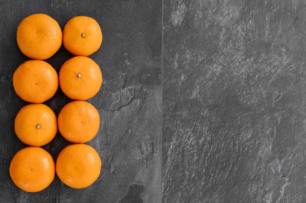 Tangerine isolated on dark background