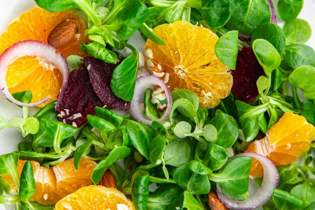 Photo tangerine salad citrus beets green leaf lettuce onion fresh delicious healthy eating meal food