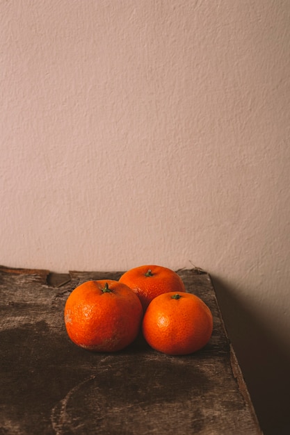 Photo tangerine, tangerine orange skin on old vintage table.