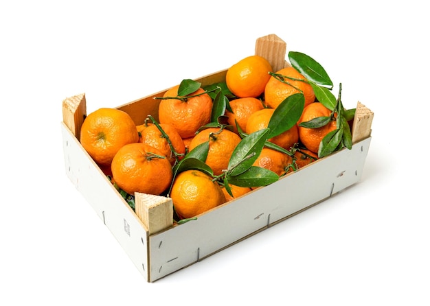 Tangerines in a box isolated on a white background