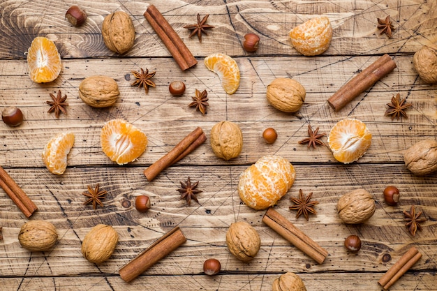 tangerines and cinnamon sticks with anise and nuts 