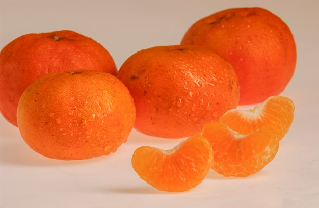 Tangerines fruit on white background. Brazilian agribusiness.