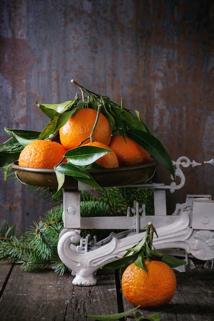 Tangerines on scales