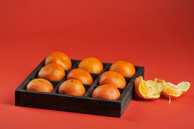 Tangerines with in wooden box