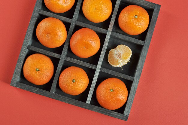 Tangerines with in wooden box