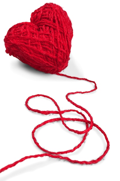 Tangle of red thread in heart shape