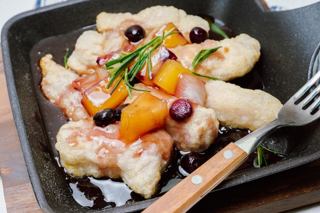 Tangsuyuk chinese food sweet and sour pork A Chinese dish made by frying flourcoated meat and pouring a boiled mixture of vinegar soybean sauce sugar vegetables etc over the meat