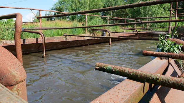 Tank filled with water at an old hydroelectric power station.