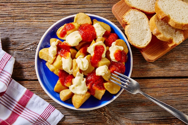 Tapas Patatas Bravas potatoe fries with tomato