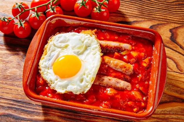 Tapas pisto con tomate ratatouille sausage egg